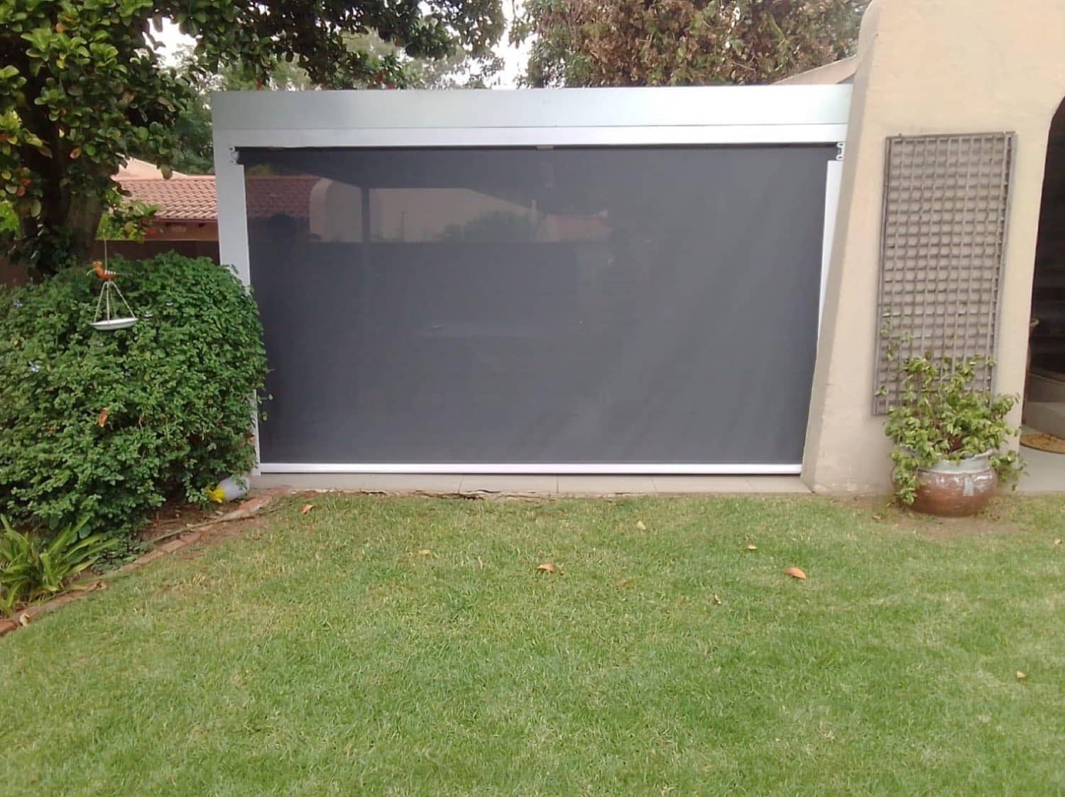 Grey drop blind screening a Gauteng garden patio