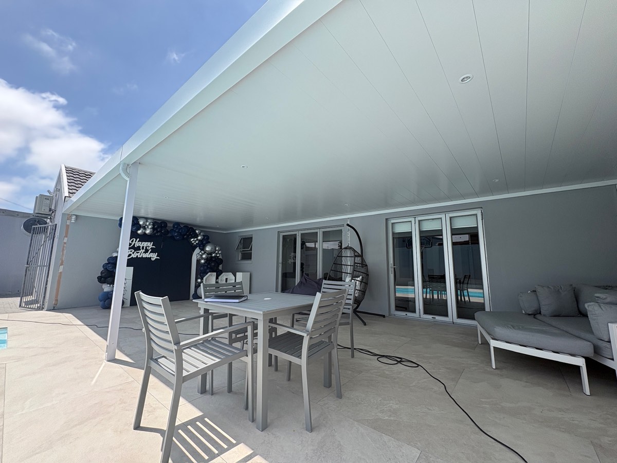 Aluminium ceiling awning under an existing patio roof