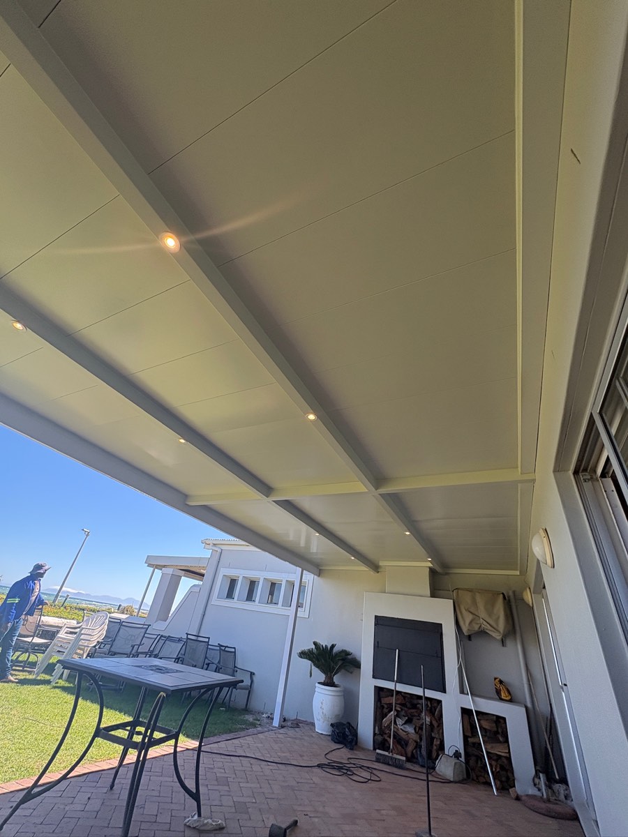Looking up at insulated ceiling awning panels and downlights on a Somerset West stoep