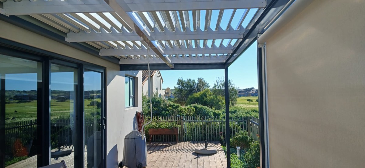 Louvre awning with outdoor roller blind engineered for Cape Town wind