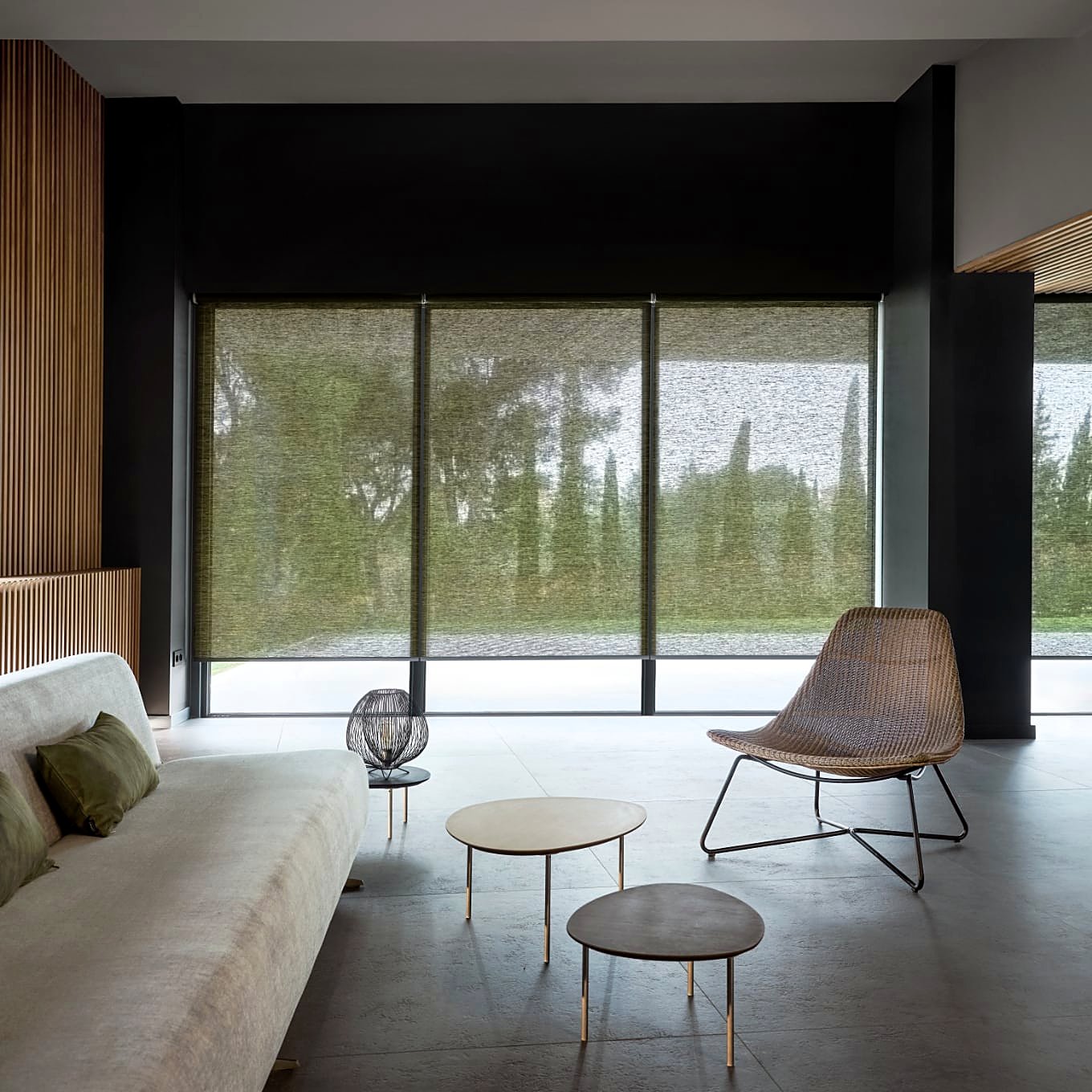 Textured screen roller blinds in a dramatic designer lounge